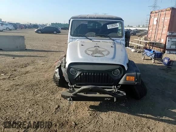 2003 Jeep Wrangler X z VIN 1J4FA39S63P356911, wystawiony jako Copart lot #81295295 z przebiegiem 92 861 mil mil oraz Szkoda całkowita • Salvage title. Historia ofert i sprzedaży dostępna na DreamBid. Obrazek 13.