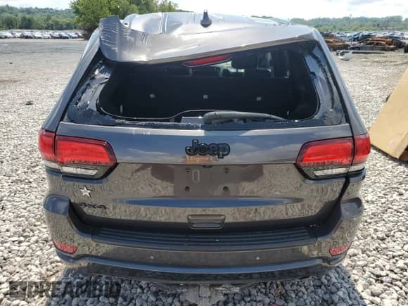2021 Jeep Grand Cherokee Laredo E with VIN 1C4RJFAG5MC770900, listed as a Copart auction lot 68569205 with 55,322 mi miles and Salvage title. Bid and sale history available at DreamBid. Image 6.