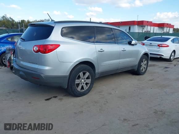 2012 Chevrolet Traverse 1LT z VIN 1GNKVGED6CJ279488, wystawiony jako IAAI lot #43546395 z przebiegiem 189 591 mil mil oraz . Historia ofert i sprzedaży dostępna na DreamBid. Obrazek 4.