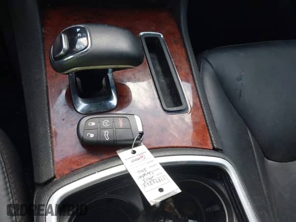 2013 Chrysler 300 with VIN 2C3CCARG0DH605717, listed as a IAAI auction lot 42693394 with 6,213 mi miles and . Bid and sale history available at DreamBid. Image 11.