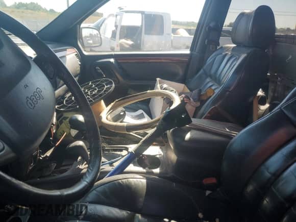 1999 Jeep Grand Cherokee Limited с VIN 1J4GW68N4XC736393, выставлен на аукционе Copart как лот 68119615 с пробегом Не указан миль и Чистый • Clean title. История ставок и продаж доступна на DreamBid. Изображение 7.