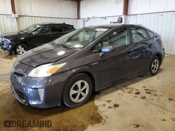 2015 Toyota Prius Four with VIN JTDKN3DUXF1909875, listed as a Copart auction lot 61843775 with 94,884 mi miles and Salvage title. Bid and sale history available at DreamBid. Image 1.