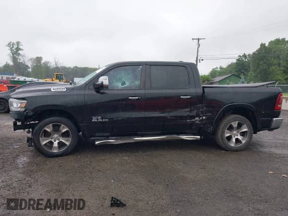 2019 Ram 1500 Laramie with VIN 1C6RREJT3KN502713, listed as a IAAI auction lot 42509778 with 83,837 mi miles and . Bid and sale history available at DreamBid. Image 15.