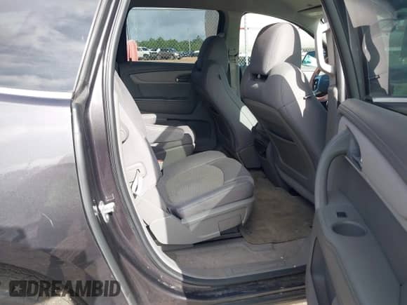 2013 Chevrolet Traverse LT z VIN 1GNKRGKDXDJ106308, wystawiony jako IAAI lot #42617918 z przebiegiem 80 823 mil mil oraz . Historia ofert i sprzedaży dostępna na DreamBid. Obrazek 8.