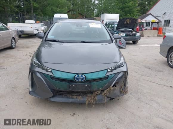2018 Toyota Prius Plus z VIN JTDKARFP7J3083814, wystawiony jako IAAI lot #42511795 z przebiegiem 138 255 mil mil oraz . Historia ofert i sprzedaży dostępna na DreamBid. Obrazek 13.