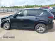 2025 Mazda CX-5 S Preferred z VIN JM3KFBCL5S0695658, wystawiony jako IAAI lot #43301142 z przebiegiem Nie podano mil oraz . Historia ofert i sprzedaży dostępna na DreamBid. Obrazek 14.