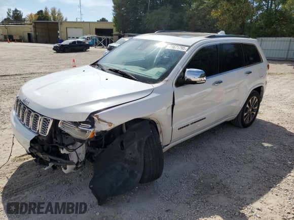 2017 Jeep Grand Cherokee Overland with VIN 1C4RJFCGXHC964499, listed as a Copart auction lot 71671795 with 117,302 mi miles and Salvage title. Bid and sale history available at DreamBid. Image 1.