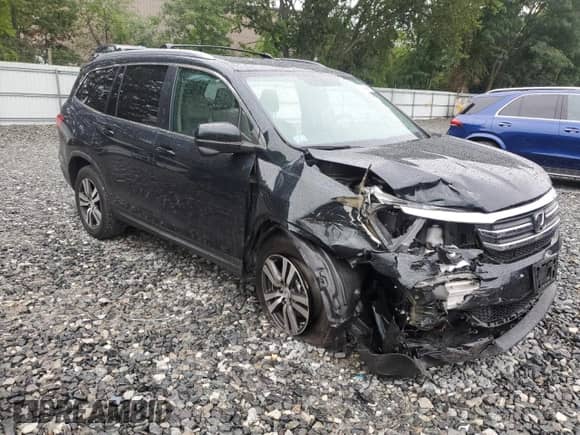 2016 Honda Pilot EX-L z VIN 5FNYF6H84GB018432, wystawiony jako Copart lot #69446965 z przebiegiem 143 613 mil mil oraz Szkoda całkowita • Salvage title. Historia ofert i sprzedaży dostępna na DreamBid. Obrazek 4.