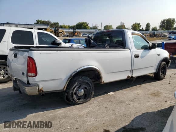 2001 Ford F-150 XL with VIN 1FTRF17W61NB20606, listed as a Copart auction lot 71057374 with Not provided miles and Salvage title. Bid and sale history available at DreamBid. Image 3.