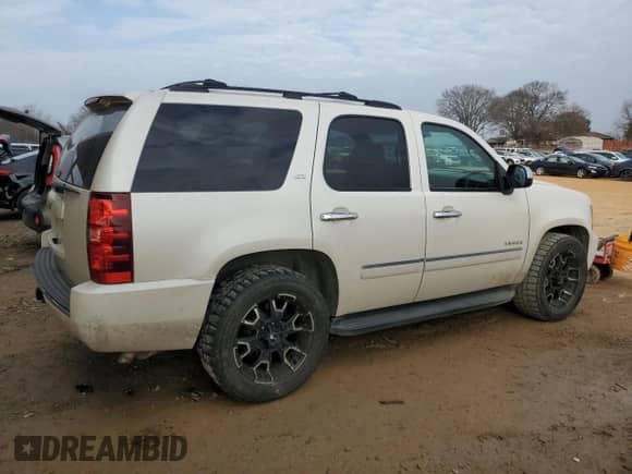 2014 Chevrolet Tahoe LTZ с VIN 1GNSCCE02ER114523, выставлен на аукционе Copart как лот 44106855 с пробегом 198 011 миль миль и Списание • Salvage title. История ставок и продаж доступна на DreamBid. Изображение 3.