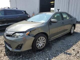 2014 Toyota Camry LE with VIN 4T1BF1FK8EU861086, listed as a Copart auction lot 66858615 with 116,615 mi miles and Salvage title. Bid and sale history available at DreamBid. Image 1.