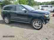 2020 Jeep Grand Cherokee Summit z VIN 1C4RJFJG7LC417296, wystawiony jako Copart lot #65007295 z przebiegiem 42 485 mil mil oraz Szkoda całkowita • Salvage title. Historia ofert i sprzedaży dostępna na DreamBid. Obrazek 4.