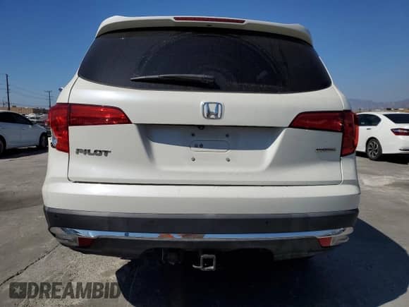 2018 Honda Pilot Touring z VIN 5FNYF5H99JB008909, wystawiony jako Copart lot #84069035 z przebiegiem 77 063 mil mil oraz Szkoda całkowita • Salvage title. Historia ofert i sprzedaży dostępna na DreamBid. Obrazek 6.