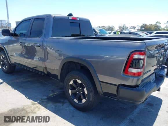 2020 Ram 1500 Rebel with VIN 1C6SRFET7LN279854, listed as a IAAI auction lot 42217980 with 82,507 mi miles and . Bid and sale history available at DreamBid. Image 3.