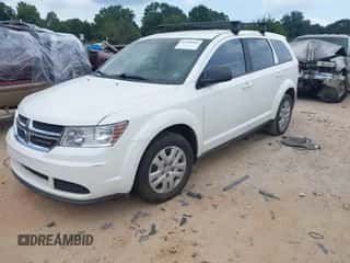 2014 Dodge Journey American Value with VIN 3C4PDCAB9ET166449, listed as a IAAI auction lot 43044943 with 106,279 mi miles and . Bid and sale history available at DreamBid. Image 2.