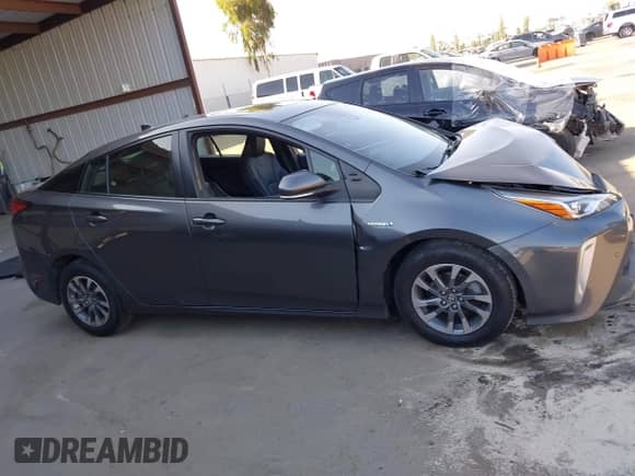 2022 Toyota Prius Nightshade with VIN JTDKAMFU4N3155017, listed as a IAAI auction lot 43013402 with 146,084 mi miles and . Bid and sale history available at DreamBid. Image 14.