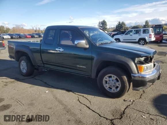 2004 Chevrolet Colorado Z71 with VIN 1GCDS198448201658, listed as a Copart auction lot 82618234 with 159,181 mi miles and Salvage title. Bid and sale history available at DreamBid. Image 4.