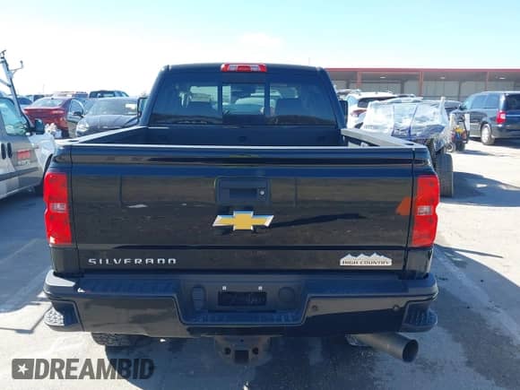 2015 Chevrolet Silverado 2500HD High Country z VIN 1GC1KXE87FF643392, wystawiony jako IAAI lot #41709949 z przebiegiem 102 017 mil mil oraz . Historia ofert i sprzedaży dostępna na DreamBid. Obrazek 16.