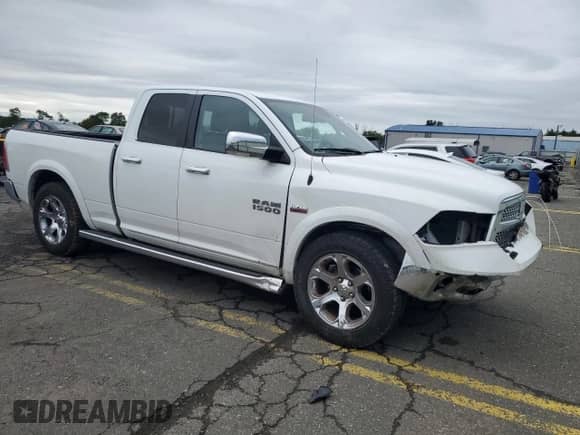 2014 Ram 1500 Laramie с VIN 1C6RR7JT4ES390876, выставлен на аукционе Copart как лот 80023095 с пробегом 173 702 миль миль и Списание • Salvage title. История ставок и продаж доступна на DreamBid. Изображение 4.