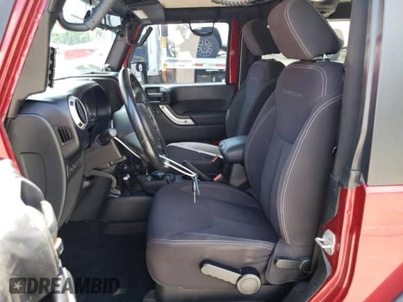 2013 Jeep Wrangler Rubicon 10th Anniversary with VIN 1C4BJWCG6DL508396, listed as a Copart auction lot 61451255 with 125,138 mi miles and Salvage title. Bid and sale history available at DreamBid. Image 7.
