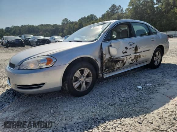 2014 Chevrolet Impala LS with VIN 2G1WA5E35E1120503, listed as a Copart auction lot 80516035 with 107,563 mi miles and Salvage title. Bid and sale history available at DreamBid. Image 1.