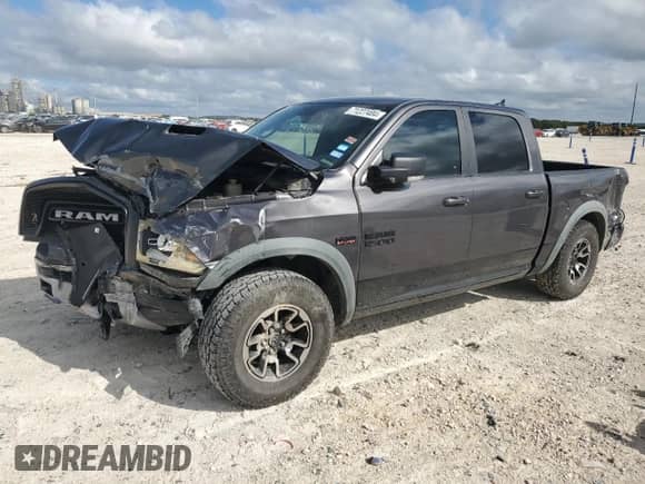 2016 Ram 1500 Rebel с VIN 1C6RR7YT7GS303545, выставлен на аукционе Copart как лот 84448734 с пробегом 151 147 миль миль и Списание • Salvage title. История ставок и продаж доступна на DreamBid. Изображение 1.