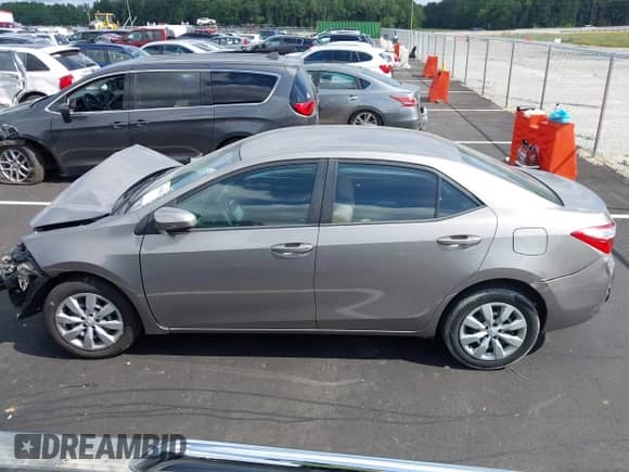 2016 Toyota Corolla L с VIN 2T1BURHE8GC662829, выставлен на аукционе IAAI как лот 43050500 с пробегом 71 579 миль миль и . История ставок и продаж доступна на DreamBid. Изображение 13.