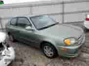 2003 Hyundai Accent GL с VIN KMHCG35C23U264701, выставлен на аукционе Copart как лот 80029154 с пробегом 142 090 миль миль и Списание • Salvage title. История ставок и продаж доступна на DreamBid. Изображение 4.