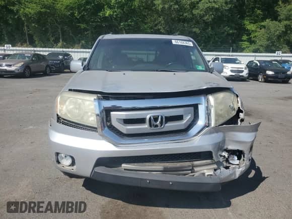2009 Honda Pilot Touring with VIN 5FNYF48829B024561, listed as a Copart auction lot 66168365 with 150,536 mi miles and Salvage title. Bid and sale history available at DreamBid. Image 5.