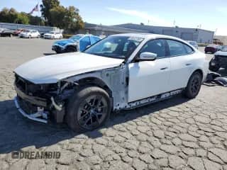 2023 BMW i4 eDrive35 with VIN WBY43AW05PFP84638, listed as a Copart auction lot 60542765 with 18,974 mi miles and Salvage title. Bid and sale history available at DreamBid. Image 1.