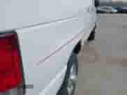 2014 Ford Econoline Cargo Super Duty Commercial with VIN 1FTSE3ELXEDA25101, listed as a IAAI auction lot 41876669 with 221,683 mi miles and . Bid and sale history available at DreamBid. Image 12.