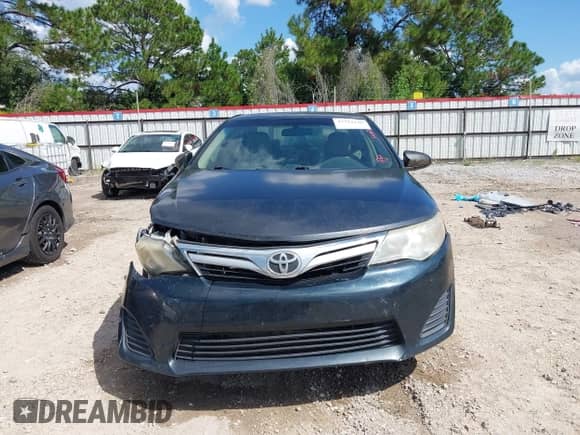 2013 Toyota Camry L with VIN 4T4BF1FK8DR306823, listed as a IAAI auction lot 43322146 with 124,085 mi miles and . Bid and sale history available at DreamBid. Image 12.
