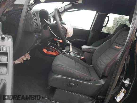 2023 Nissan Frontier Pro-X with VIN 1N6ED1EJ7PN646860, listed as a Copart auction lot 59143685 with 35,755 mi miles and Salvage title. Bid and sale history available at DreamBid. Image 7.