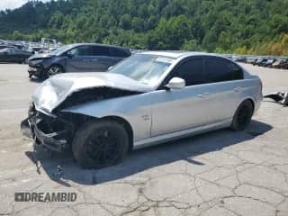 2010 BMW 3 Series 328i xDrive with VIN WBAPK7C52AA460570, listed as a Copart auction lot 66197485 with 217,145 mi miles and Salvage title. Bid and sale history available at DreamBid. Image 1.