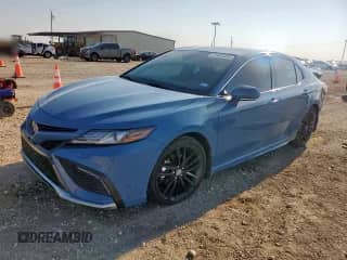 2023 Toyota Camry Hybrid XSE с VIN 4T1K31AK7PU046557, выставлен на аукционе Copart как лот 71445455 с пробегом 33 068 миль миль и Списание • Salvage title. История ставок и продаж доступна на DreamBid. Изображение 1.