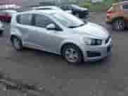 2012 Chevrolet Sonic LS with VIN 1G1JB6SH2C4114902, listed as a IAAI auction lot 42166155 with 140,977 mi miles and . Bid and sale history available at DreamBid. Image 1.