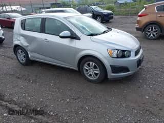 2012 Chevrolet Sonic LS with VIN 1G1JB6SH2C4114902, listed as a IAAI auction lot 42166155 with 140,977 mi miles and . Bid and sale history available at DreamBid. Image 1.