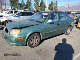 2003 Hyundai Accent GL с VIN KMHCG45C63U430403, выставлен на аукционе Copart как лот 86430724 с пробегом 74 200 миль миль и Списание • Salvage title. История ставок и продаж доступна на DreamBid. Изображение 1.