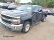2016 Chevrolet Silverado 1500 LT z VIN 1GCVKREC5GZ267678, wystawiony jako IAAI lot #43234485 z przebiegiem Nie podano mil oraz . Historia ofert i sprzedaży dostępna na DreamBid. Obrazek 17.