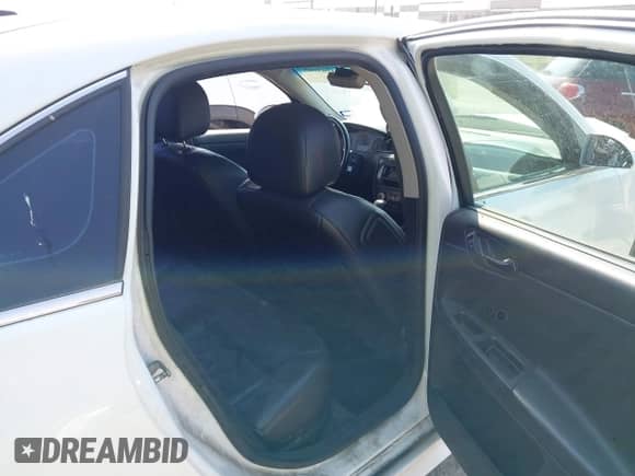 2012 Chevrolet Impala LTZ z VIN 2G1WC5E34C1168128, wystawiony jako IAAI lot #43263945 z przebiegiem 230 688 mil mil oraz . Historia ofert i sprzedaży dostępna na DreamBid. Obrazek 8.