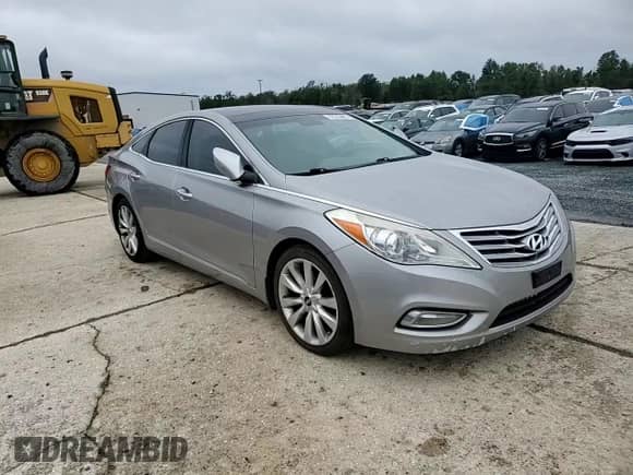 2012 Hyundai Azera with VIN KMHFH4JG9CA134327, listed as a Copart auction lot 82285485 with 113,806 mi miles and Salvage title. Bid and sale history available at DreamBid. Image 13.