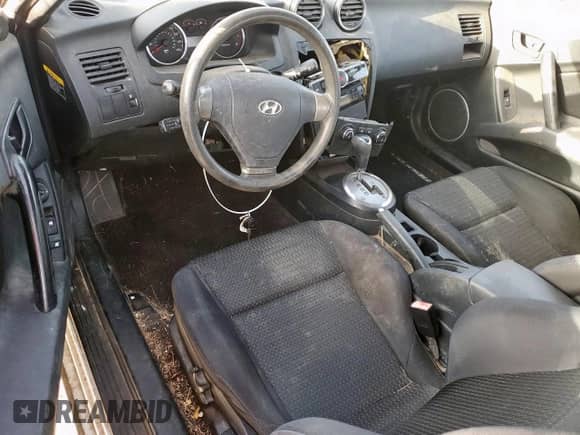 2007 Hyundai Tiburon GS с VIN KMHHM66D27U260421, выставлен на аукционе Copart как лот 48982505 с пробегом 100 045 миль миль и Чистый • Clean title. История ставок и продаж доступна на DreamBid. Изображение 8.
