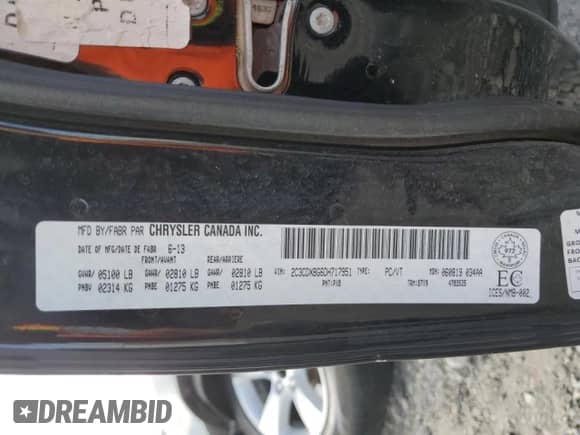 2013 Dodge Charger SE with VIN 2C3CDXBG6DH717951, listed as a Copart auction lot 62427055 with 131,247 mi miles and Salvage title. Bid and sale history available at DreamBid. Image 12.
