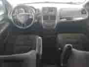 2015 Dodge Grand Caravan American Value z VIN 2C4RDGBG4FR642394, wystawiony jako Copart lot #81739545 z przebiegiem 168 733 mil mil oraz Czysty tytuł • Clean title. Historia ofert i sprzedaży dostępna na DreamBid. Obrazek 8.