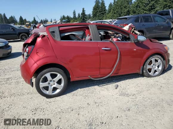 2013 Chevrolet Sonic LTZ with VIN 1G1JE6SB4D4187015, listed as a Copart auction lot 65932495 with Not provided miles and Non repairable. Bid and sale history available at DreamBid. Image 3.