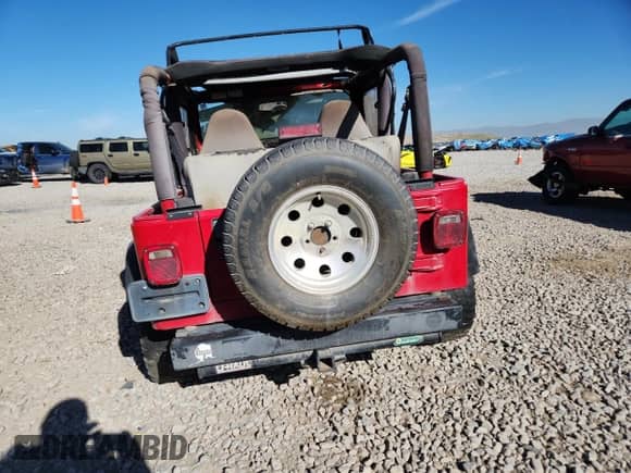 2001 Jeep Wrangler SE with VIN 1J4FA29P31P332021, listed as a Copart auction lot 91076825 with Not provided miles and Clean title. Bid and sale history available at DreamBid. Image 6.