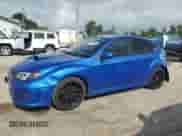 2014 Subaru WRX WRX with VIN JF1GR7E69EG251100, listed as a Copart auction lot 64001835 with 211,562 mi miles and Salvage title. Bid and sale history available at DreamBid. Image 1.