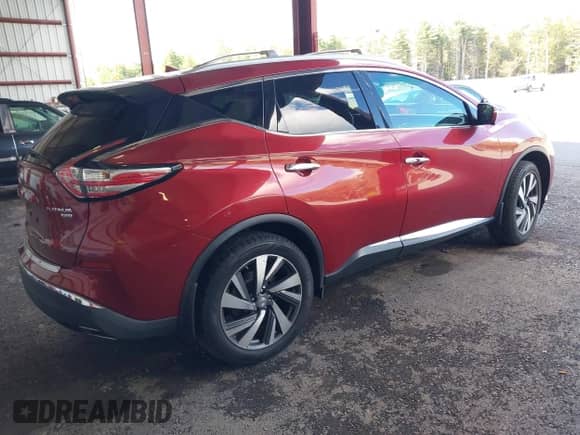 2015 Nissan Murano Platinum z VIN 5N1AZ2MH5FN203091, wystawiony jako IAAI lot #43314107 z przebiegiem 101 292 mil mil oraz . Historia ofert i sprzedaży dostępna na DreamBid. Obrazek 4.