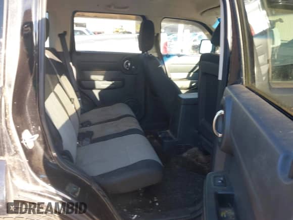 2009 Dodge Nitro SE with VIN 1D8GT28KX9W518412, listed as a IAAI auction lot 41458414 with 178,308 mi miles and . Bid and sale history available at DreamBid. Image 8.