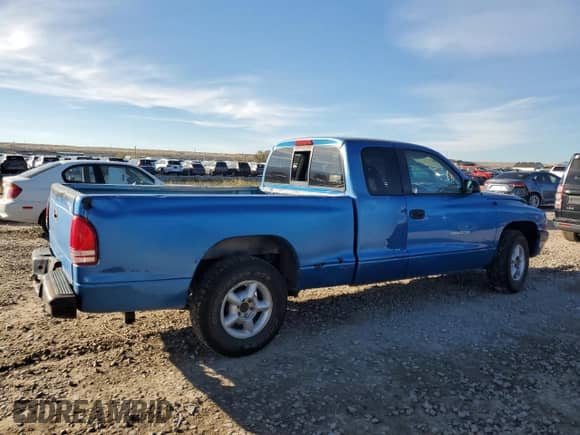 1999 Dodge Dakota z VIN 1B7FL22P9XS232649, wystawiony jako Copart lot #90369735 z przebiegiem 231 976 mil mil oraz Czysty tytuł • Clean title. Historia ofert i sprzedaży dostępna na DreamBid. Obrazek 3.